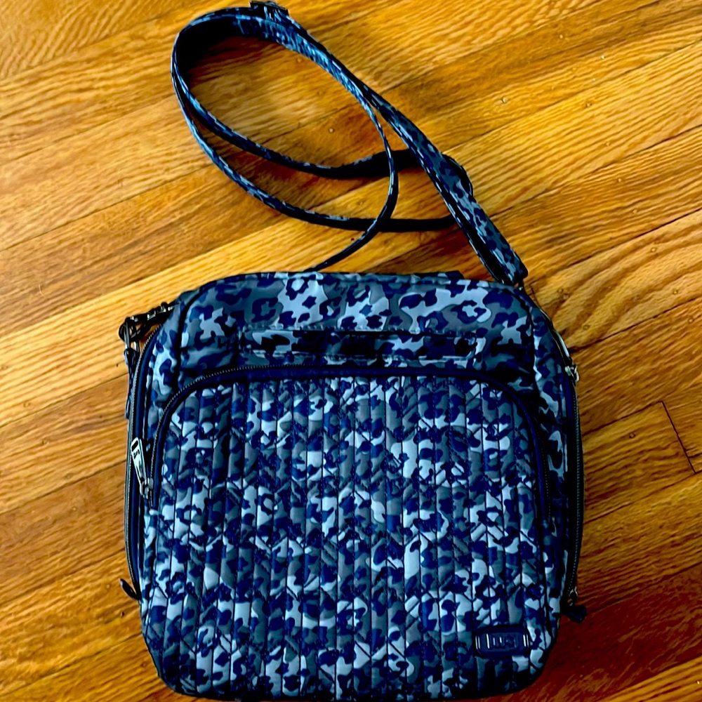 Lug cross body bag. Purchased on QVC and has never been used.